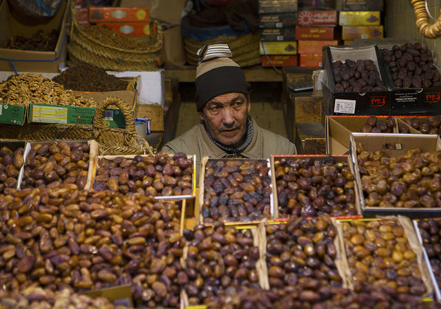 A shopkeeper selling figs at Fez Medina 